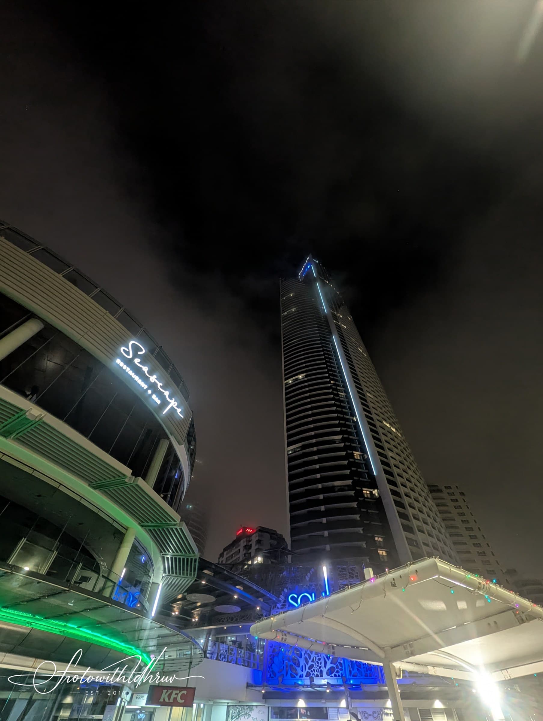Neon Monoliths in the Midnight Mist
